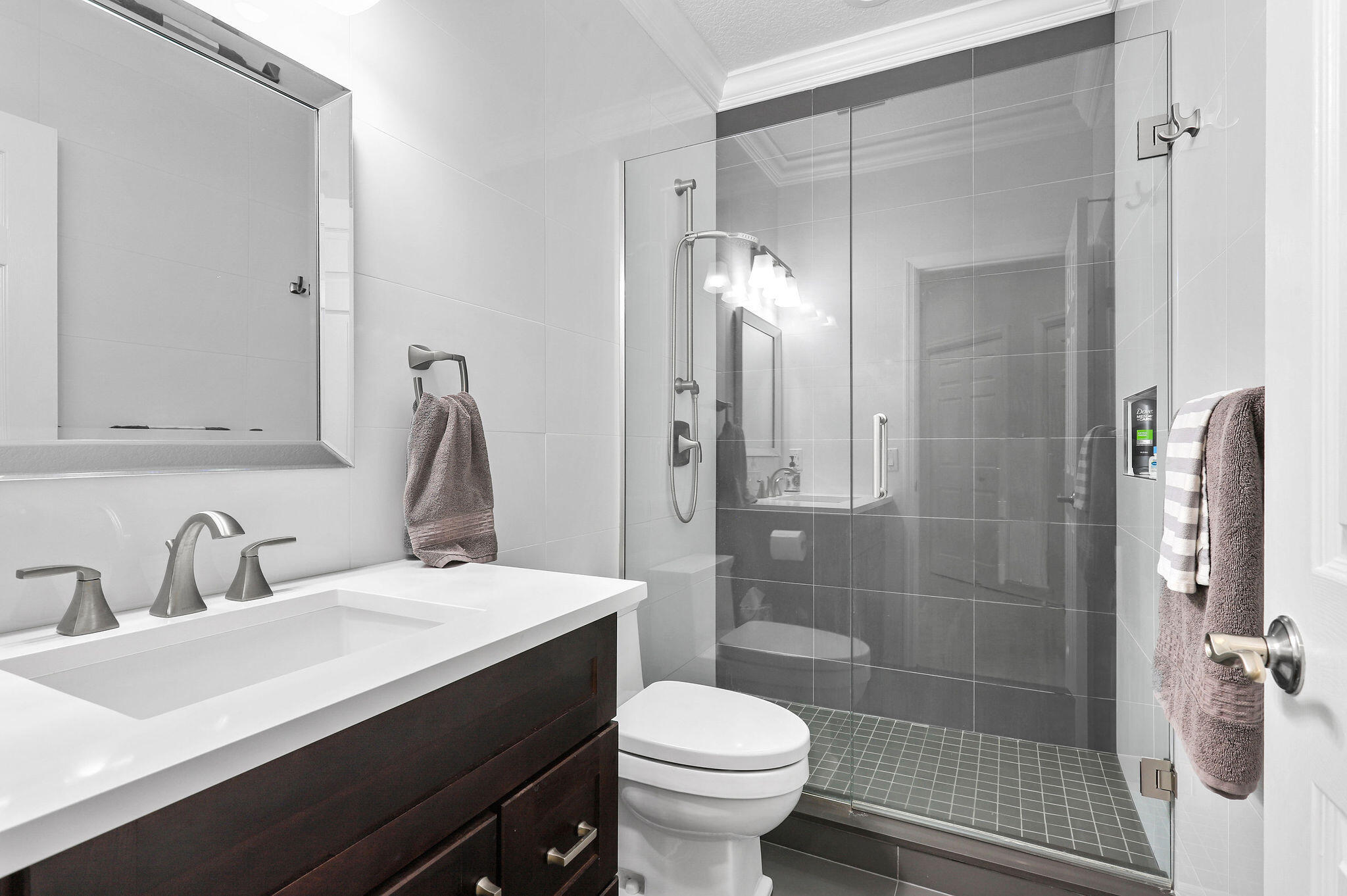 2056 Windward Way Jupiter, FL 33477 - Photo 24 of 58 a bathroom with a sink toilet and shower