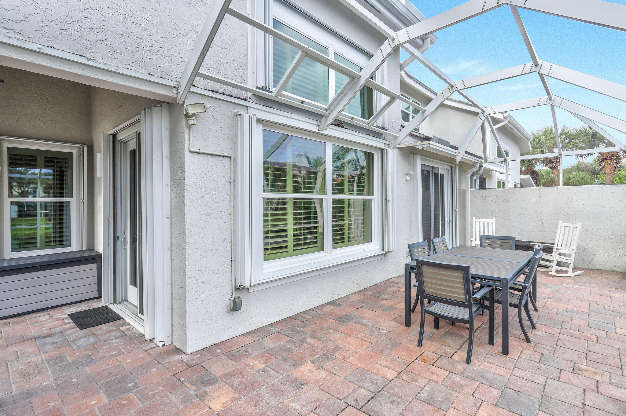 2056 Windward Way Jupiter, FL 33477 - Photo 31 of 58 a view of a dining room with furniture and a window