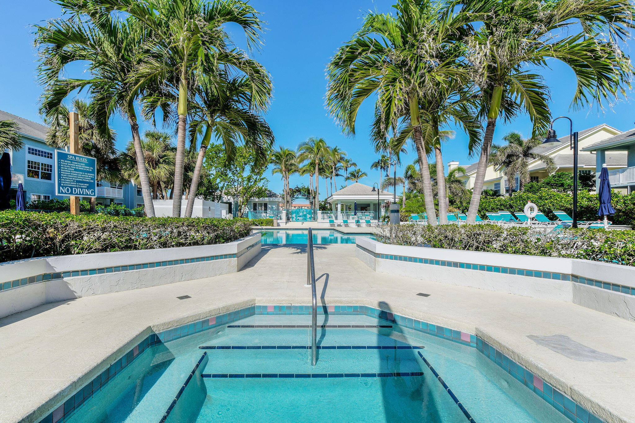 2056 Windward Way Jupiter, FL 33477 - Photo 53 of 58 a view of a swimming pool with a patio