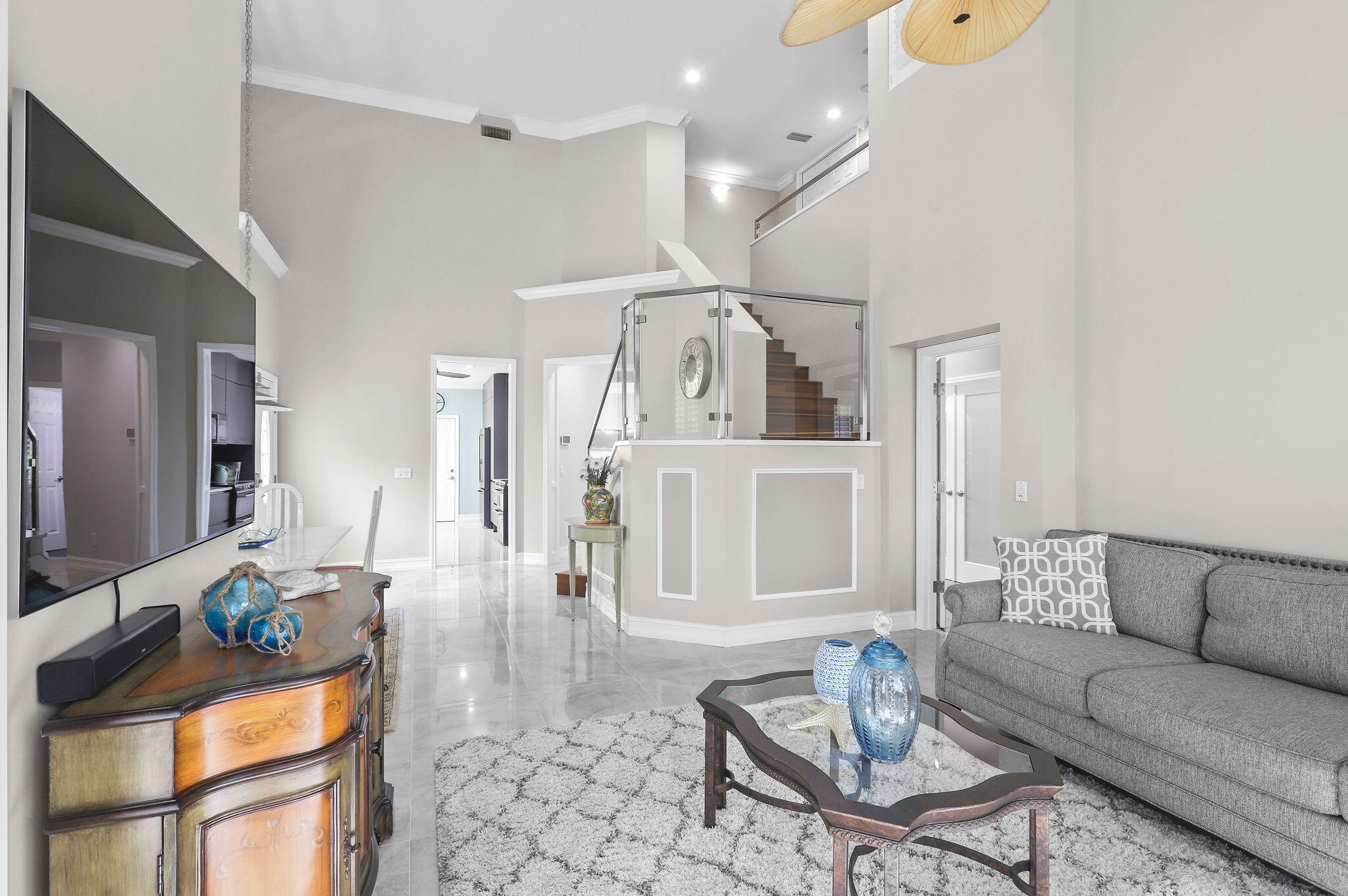 2056 Windward Way Jupiter, FL 33477 - Photo 6 of 58 a living room with furniture and wooden floor