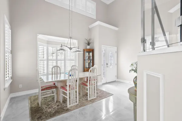 a kitchen with a sink stainless steel appliances and cabinets
