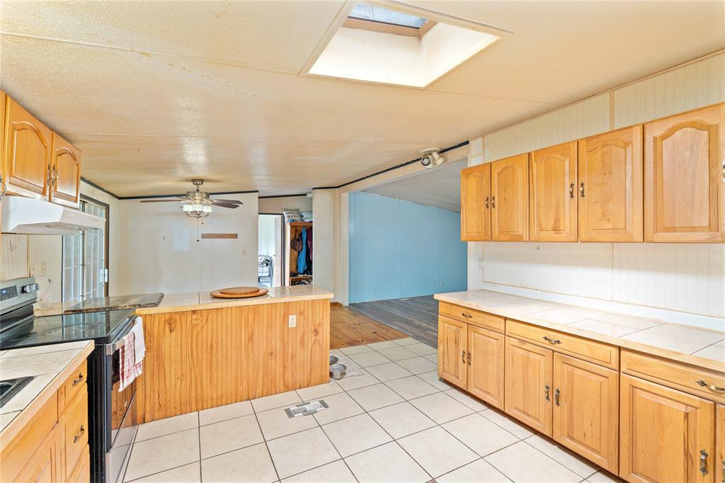 210 7th Street Blanket, TX 76432 - Photo 11 of 33 a view of a kitchen with electric appliances