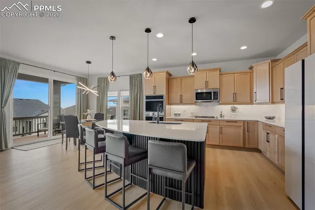 a large kitchen with lots of counter space and appliances