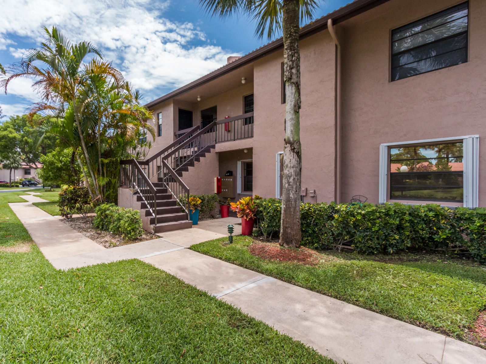 9232 Pecky Cypress Lane, Unit 2F Boca Raton, FL 33428 - Photo 1 of 38 Front