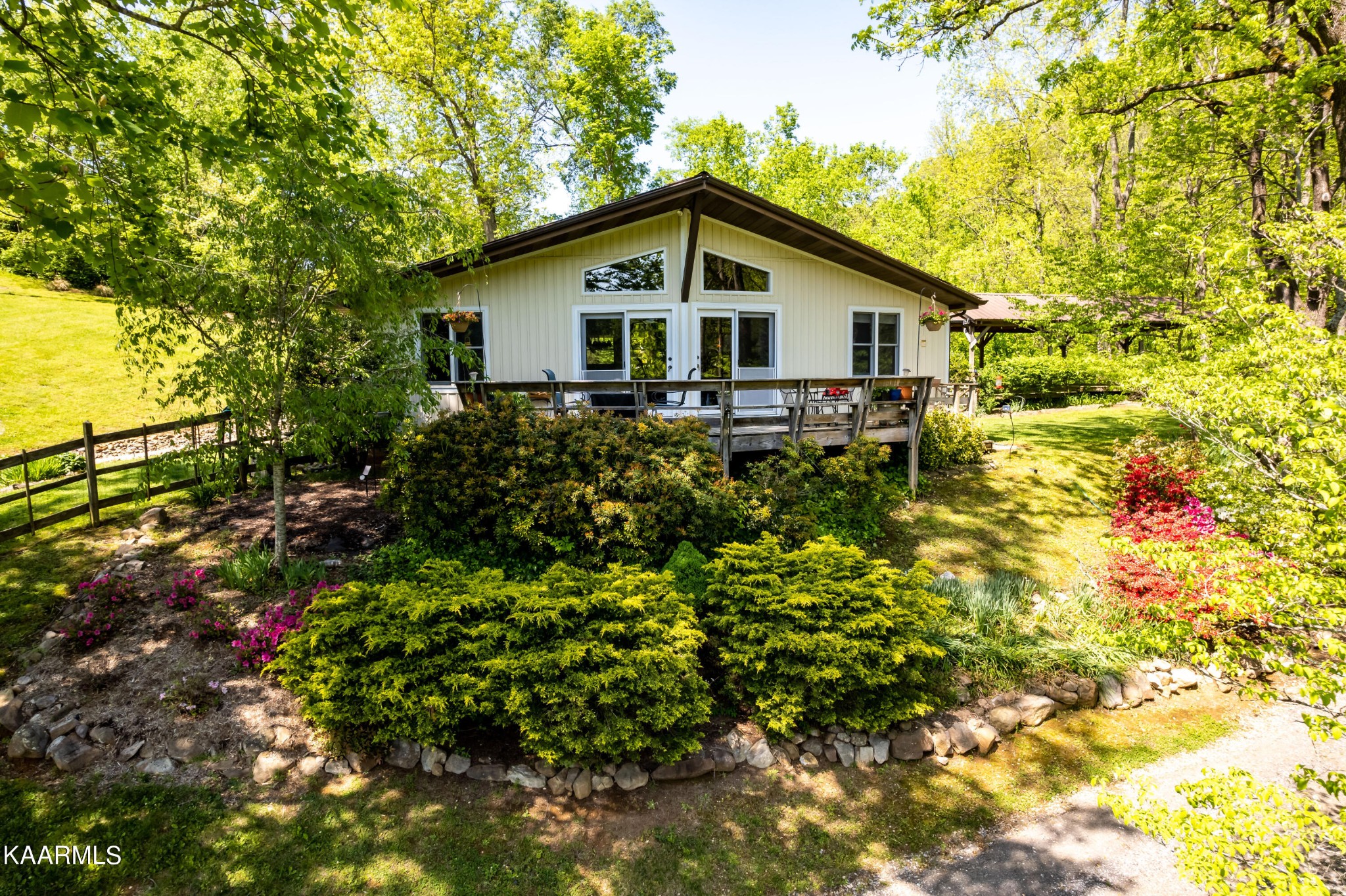 1610 A R Davis Road Seymour, TN 37865 - Photo 2 of 55 a view of a backyard with plants and large trees