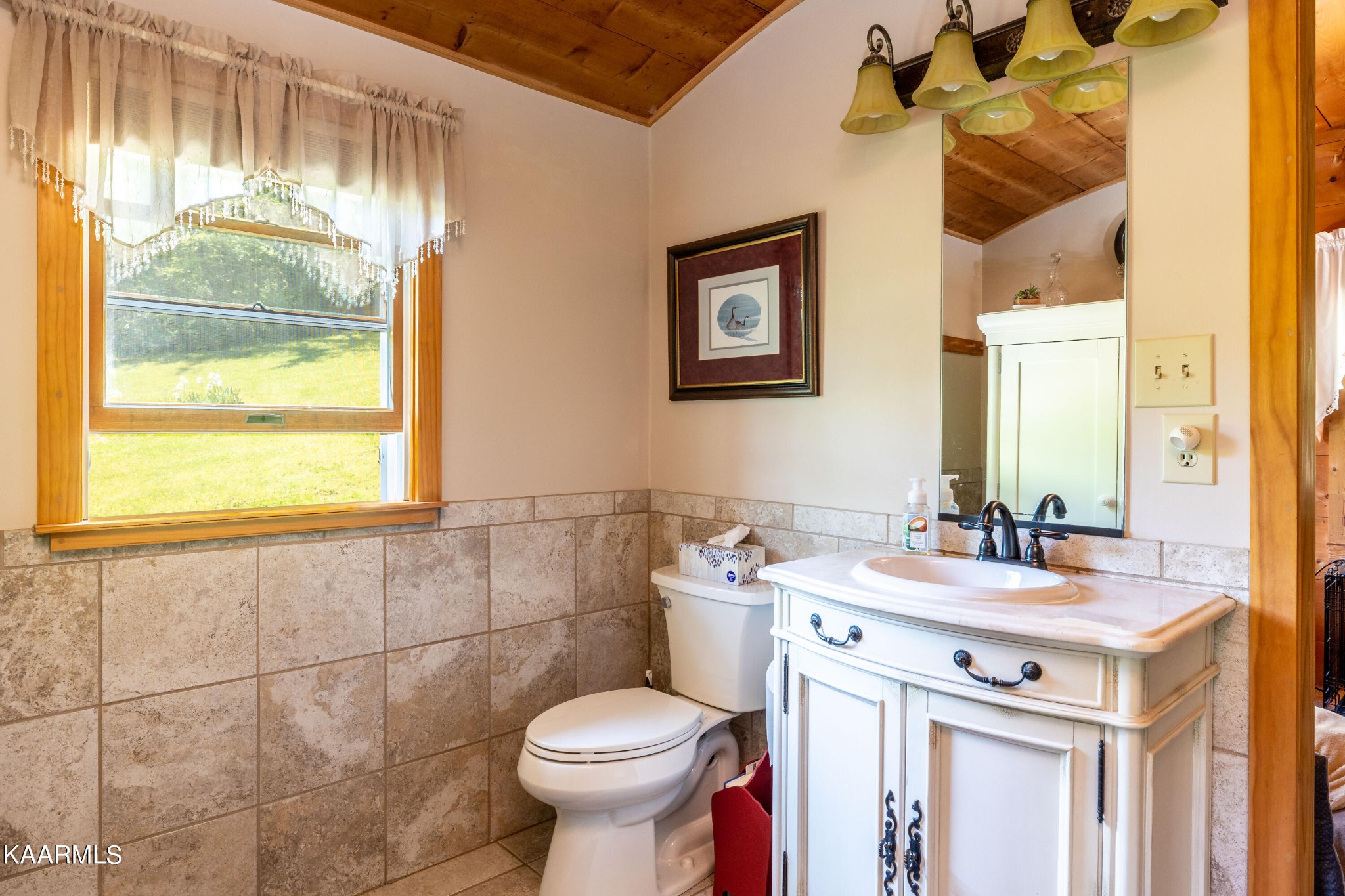 1610 A R Davis Road Seymour, TN 37865 - Photo 23 of 55 a bathroom with a sink toilet and mirror