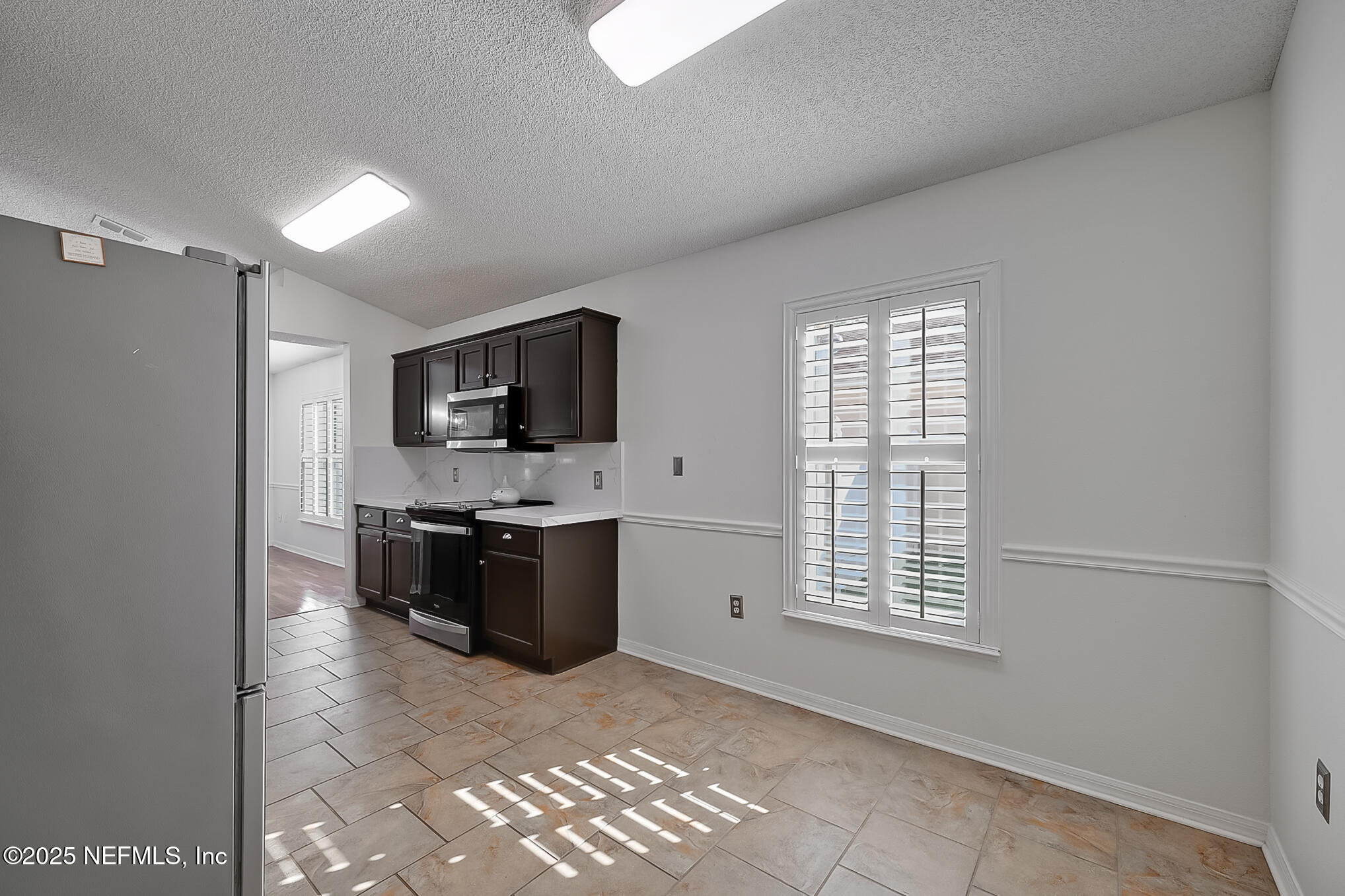 3204 Carlotta Road Middleburg, FL 32068 - Photo 24 of 39 23 Breakfast Nook and Kitchen