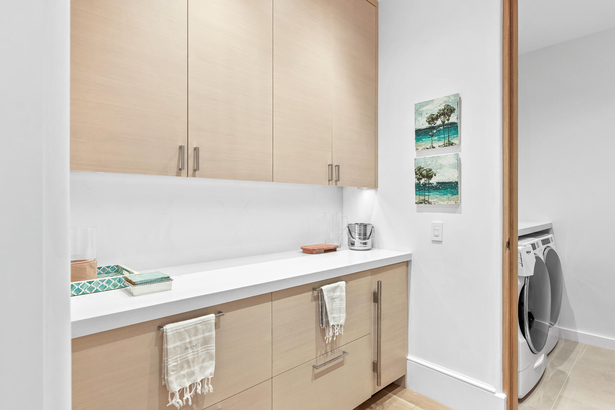 290 Sea Gardens St Inlet Beach, Unit 301 Inlet Beach, FL 32461 - Photo 30 of 43 a utility room with a sink a washer and dryer