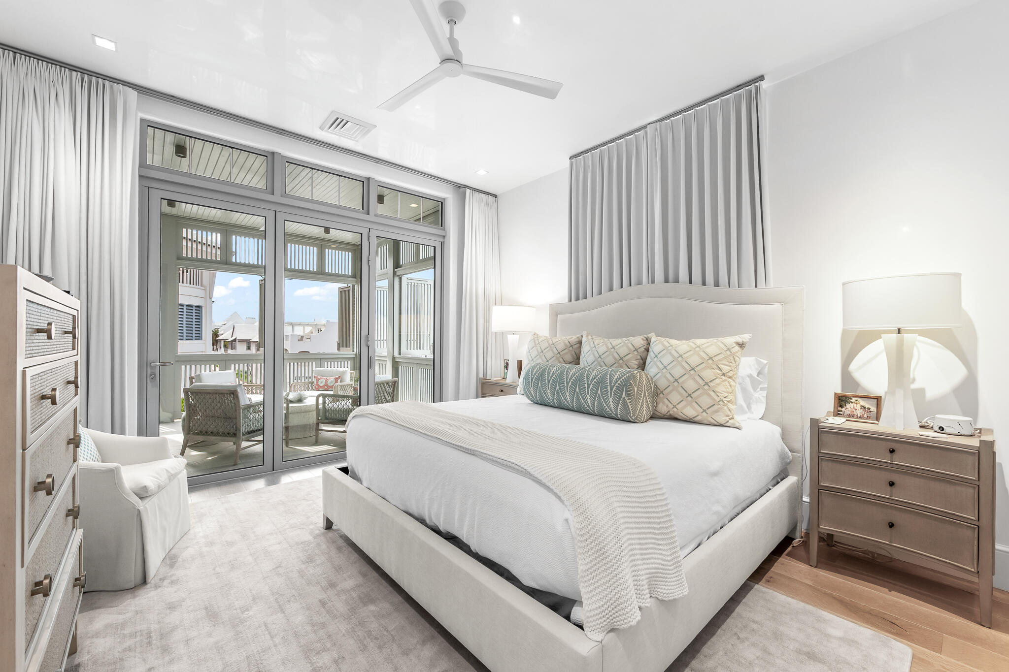 290 Sea Gardens St Inlet Beach, Unit 301 Inlet Beach, FL 32461 - Photo 31 of 43 a bedroom with a large bed and a large window