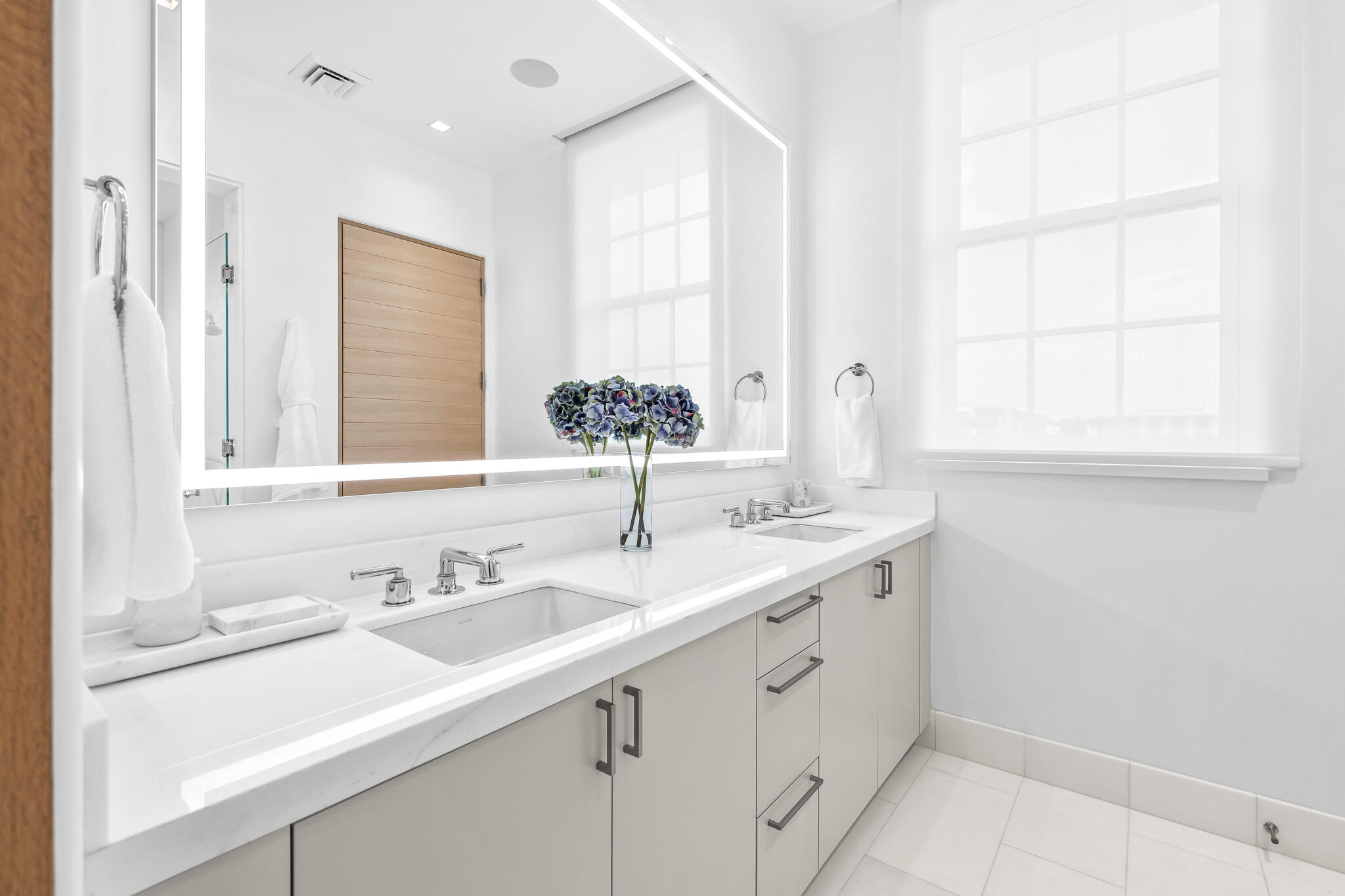 290 Sea Gardens St Inlet Beach, Unit 301 Inlet Beach, FL 32461 - Photo 32 of 43 a bathroom with a sink and a mirror