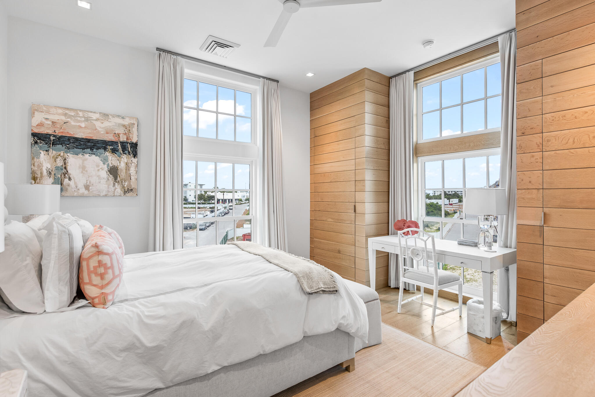 290 Sea Gardens St Inlet Beach, Unit 301 Inlet Beach, FL 32461 - Photo 5 of 43 a bedroom with a bed and wooden floor