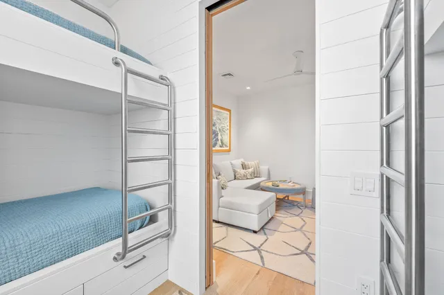 a dining room with furniture and a window