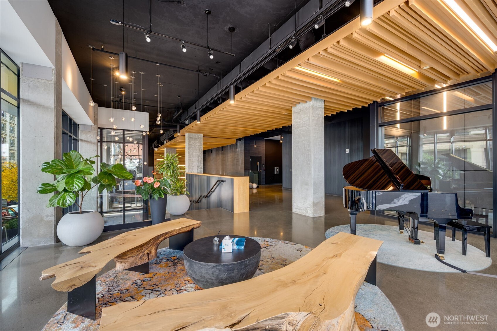 450 South Main Street, Unit 616 Seattle, WA 98104 - Photo 24 of 40 a lobby with furniture and a potted plant