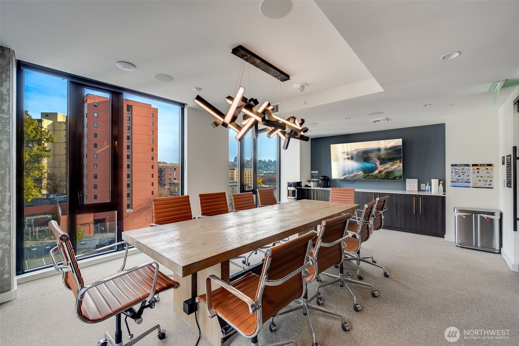 450 South Main Street, Unit 616 Seattle, WA 98104 - Photo 28 of 40 a view of a dining room with furniture window and wooden floor