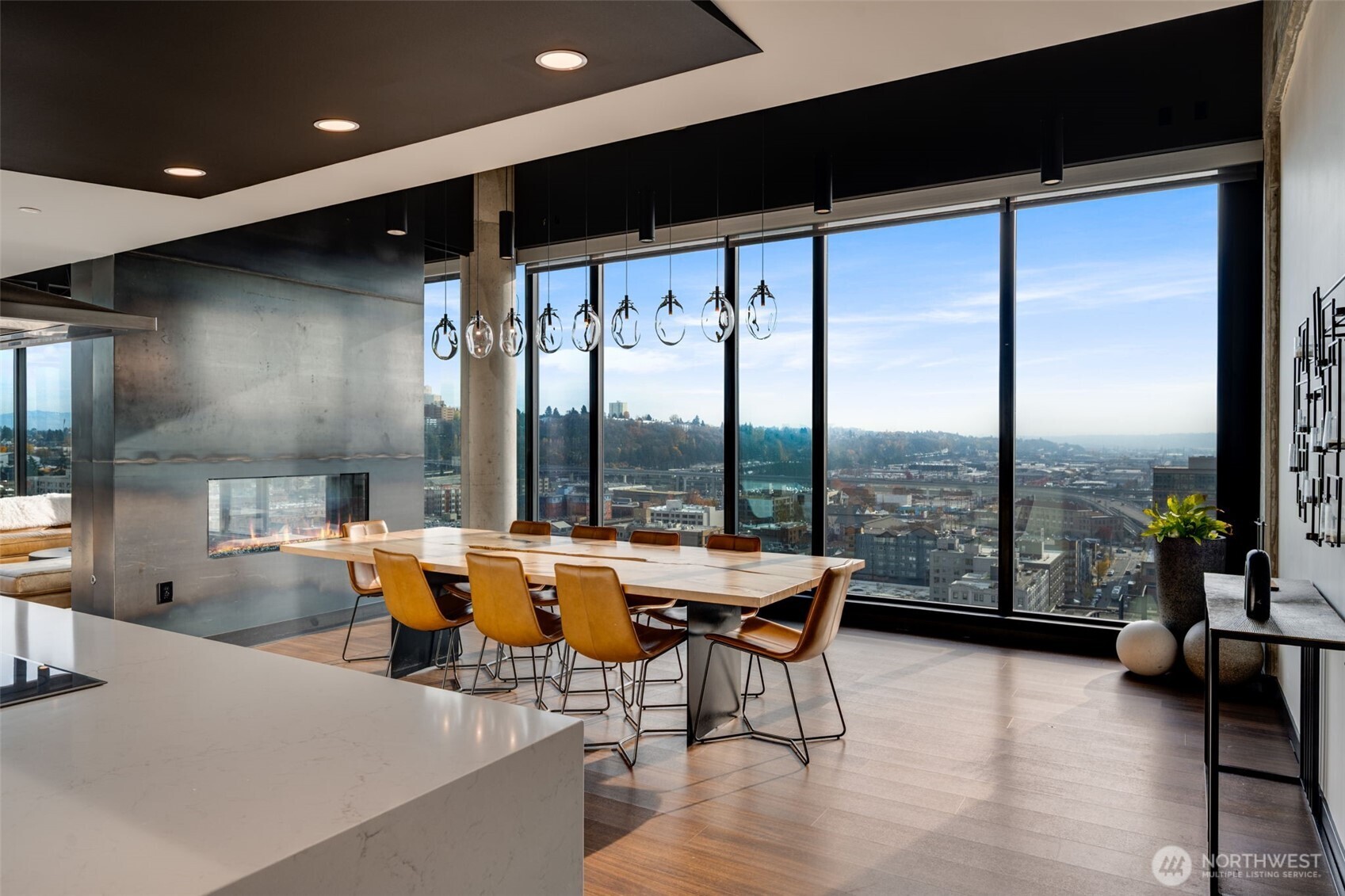 450 South Main Street, Unit 616 Seattle, WA 98104 - Photo 31 of 40 a living room with furniture and floor to ceiling window