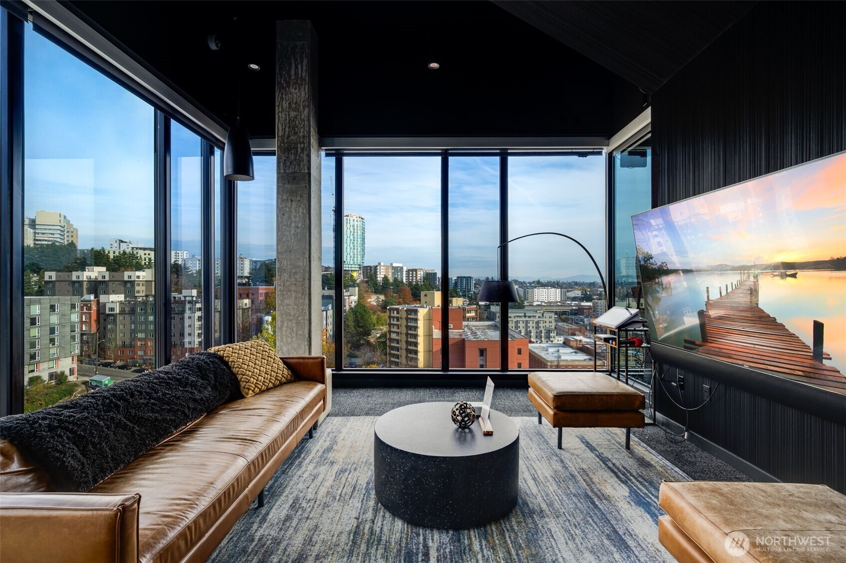 450 South Main Street, Unit 616 Seattle, WA 98104 - Photo 32 of 40 a living room with furniture and a large window