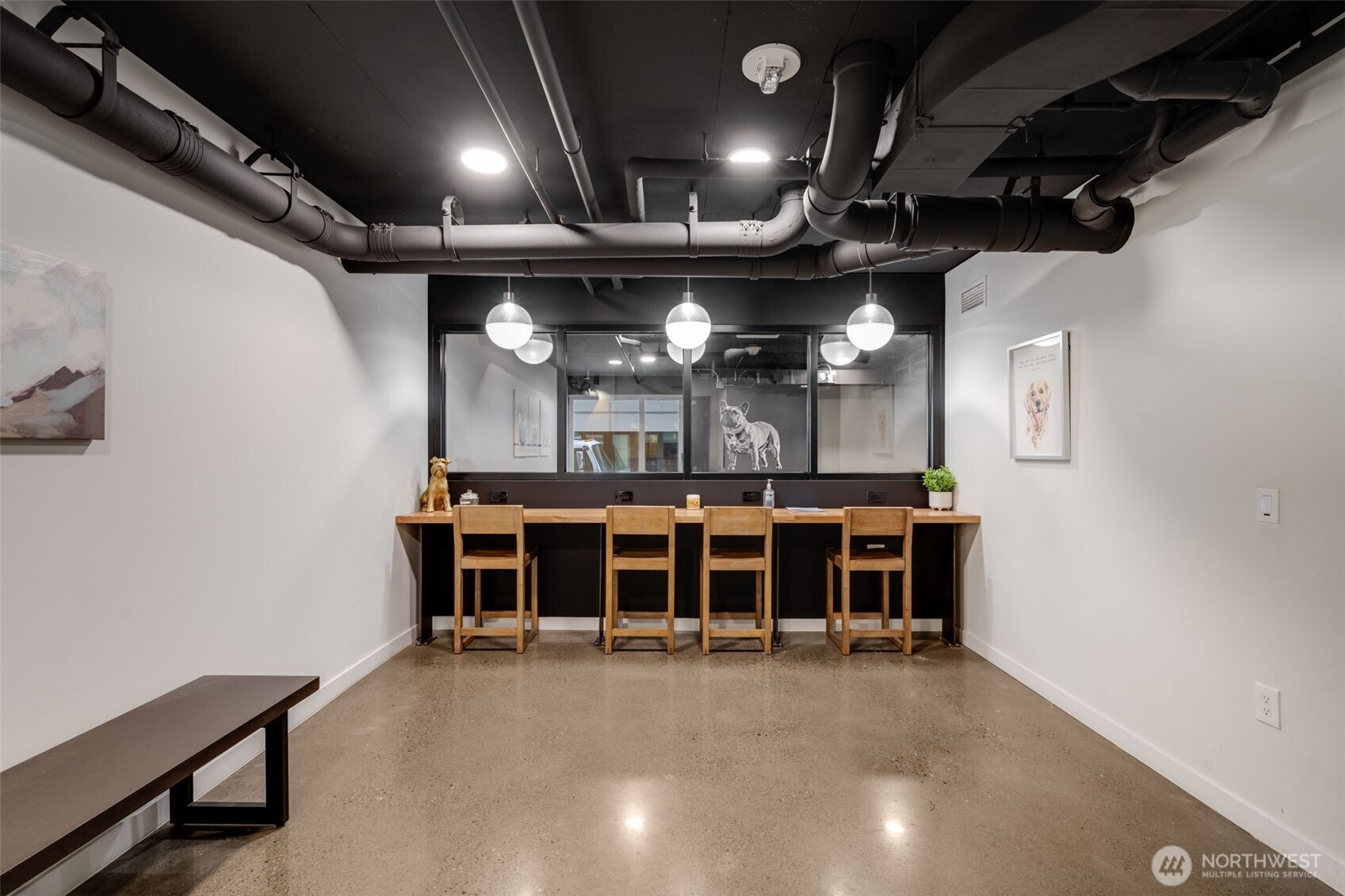 450 South Main Street, Unit 616 Seattle, WA 98104 - Photo 37 of 40 a view of a room with a table and chairs
