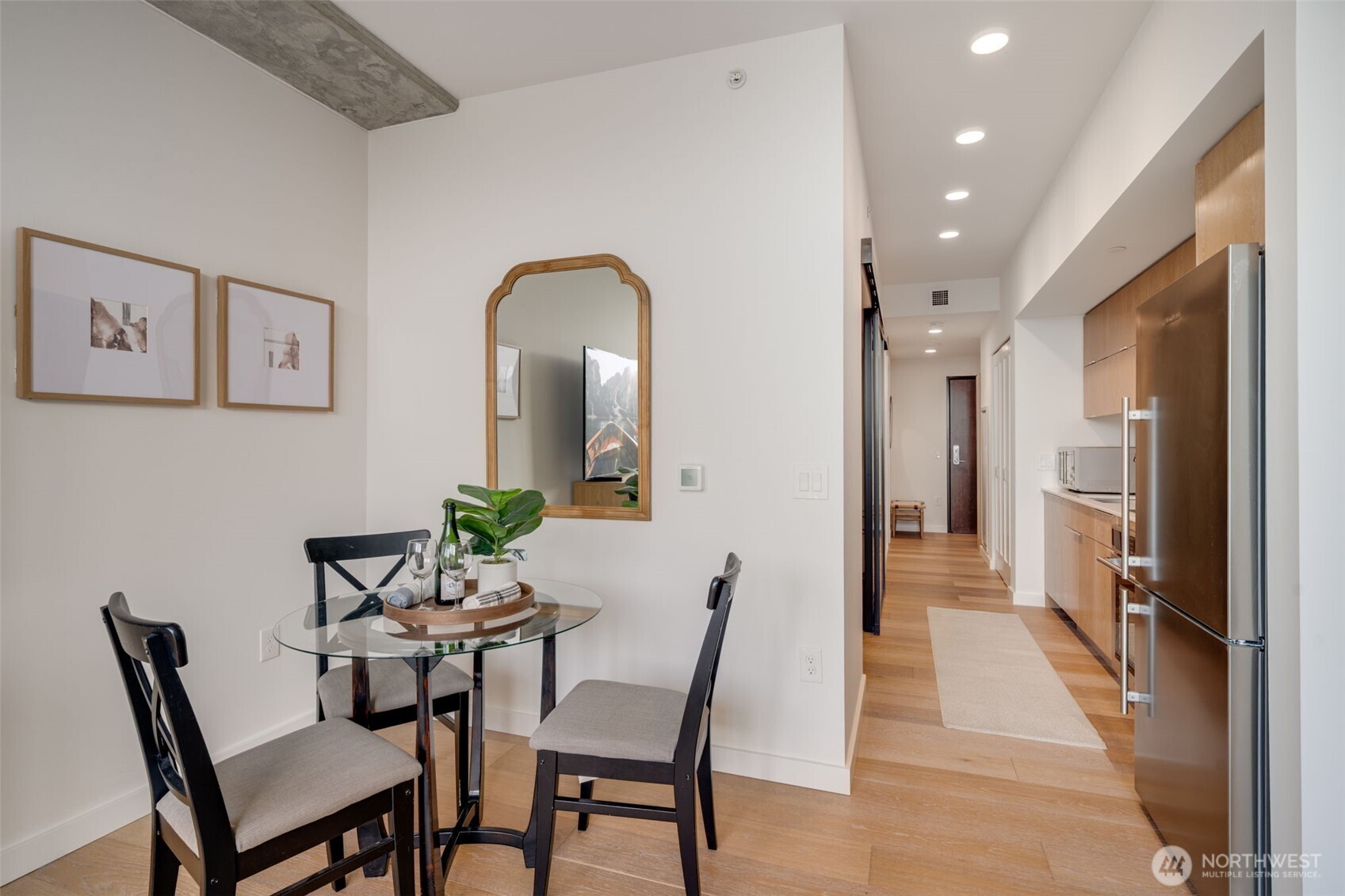 450 South Main Street, Unit 616 Seattle, WA 98104 - Photo 9 of 40 a view of a dining room with furniture