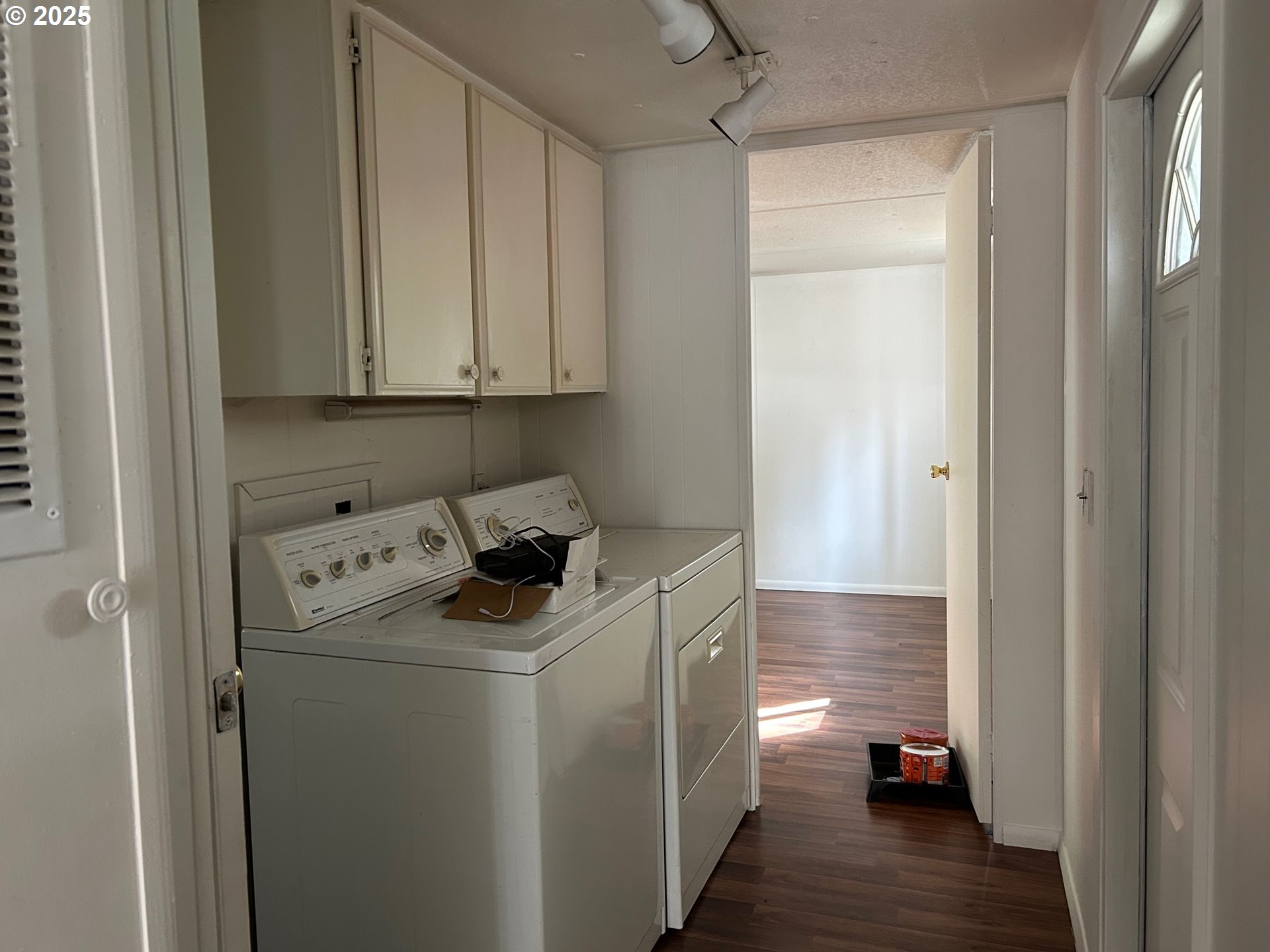 89510 Highway 101, Unit 26 Florence, OR 97439 - Photo 12 of 16 a utility room with dryer and washer