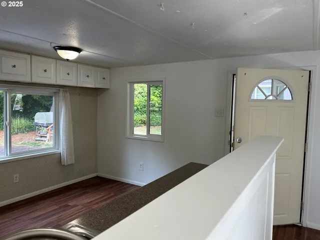 a view of an empty room and window