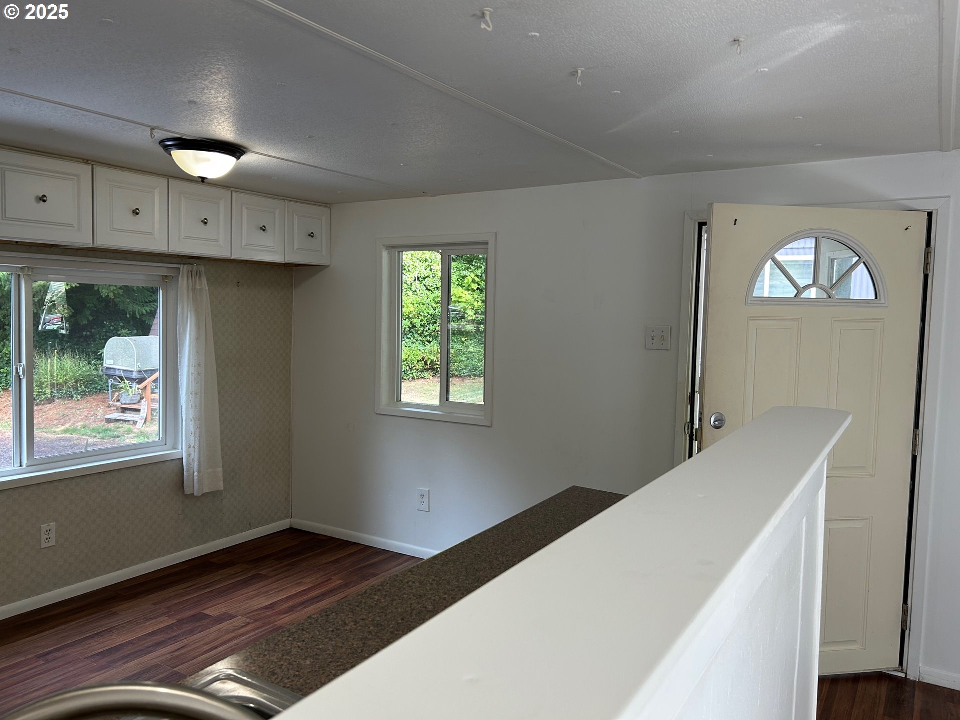 89510 Highway 101, Unit 26 Florence, OR 97439 - Photo 15 of 16 a view of an empty room and window