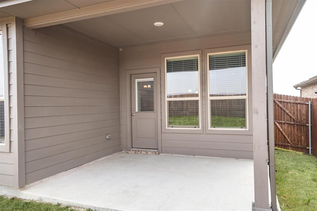 1864 Mensa Drive Haslet, TX 76052 - Photo 34 of 40 a view of an empty room with a window