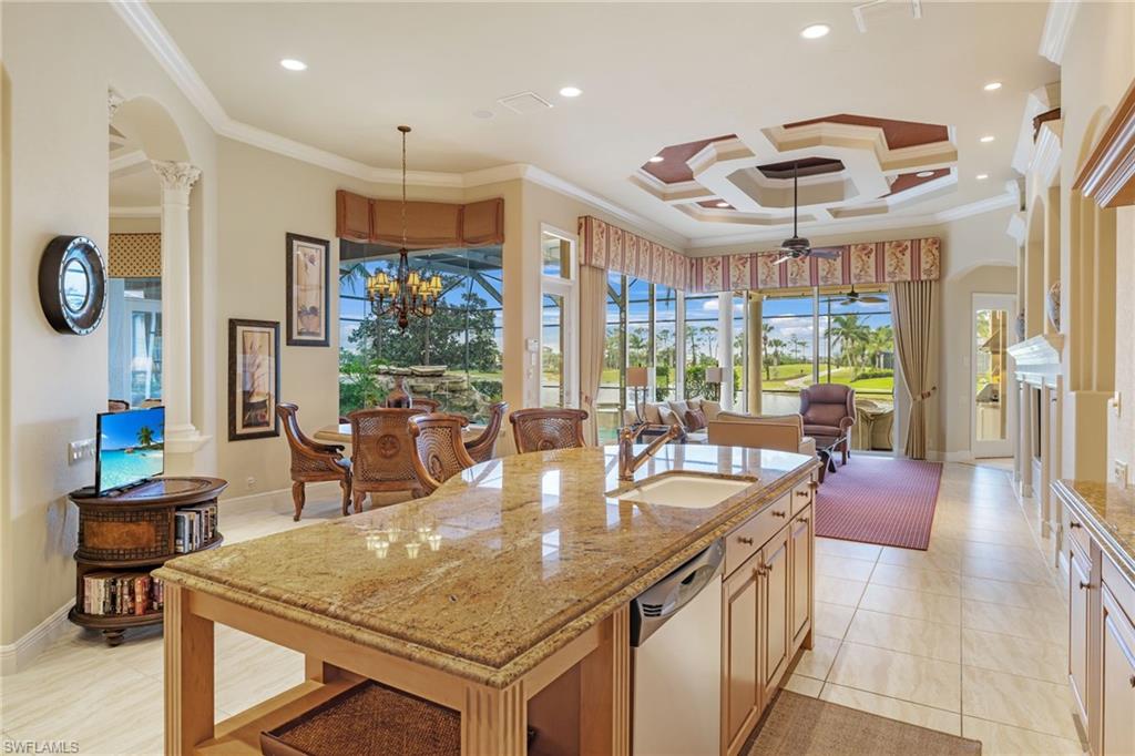 7511 Hogan Court Naples, FL 34113 - Photo 11 of 50 a view of a dining room with furniture window and outside view