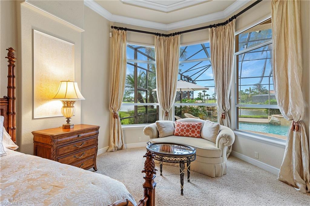 7511 Hogan Court Naples, FL 34113 - Photo 22 of 50 a bedroom with two beds and a large window