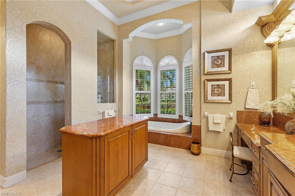 7511 Hogan Court Naples, FL 34113 - Photo 25 of 50 a living room with furniture and a large window