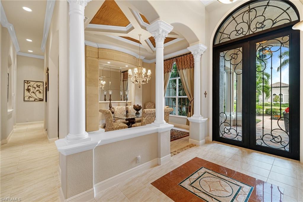 7511 Hogan Court Naples, FL 34113 - Photo 3 of 50 a very nice looking living room with a large window with outer view