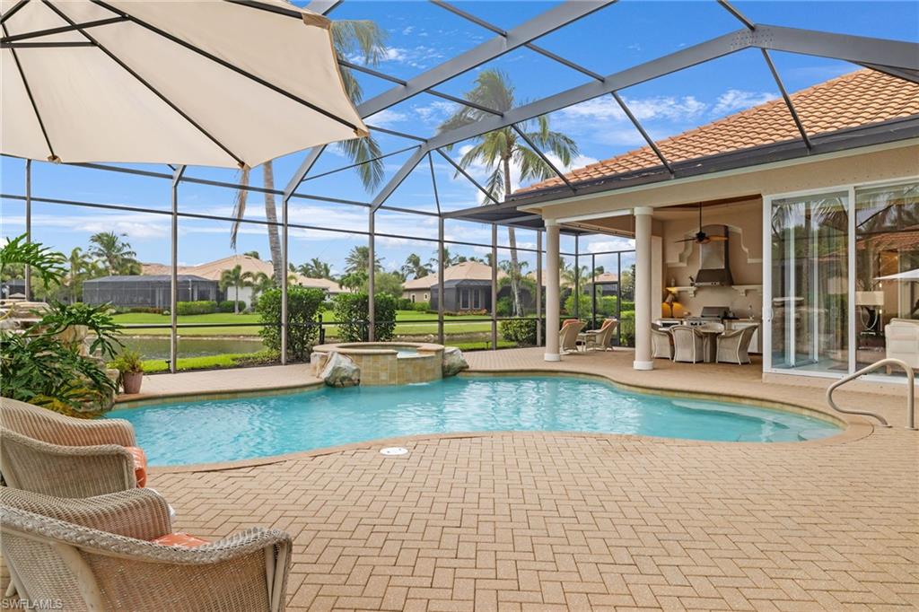 7511 Hogan Court Naples, FL 34113 - Photo 38 of 50 a house view with a sitting space