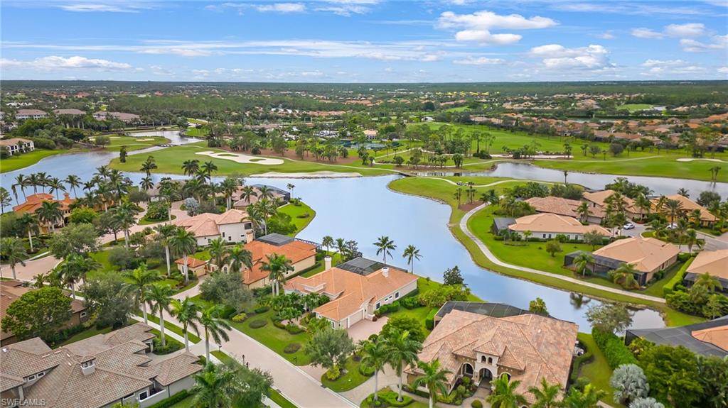 7511 Hogan Court Naples, FL 34113 - Photo 43 of 50 an aerial view of ocean and residential houses with outdoor space