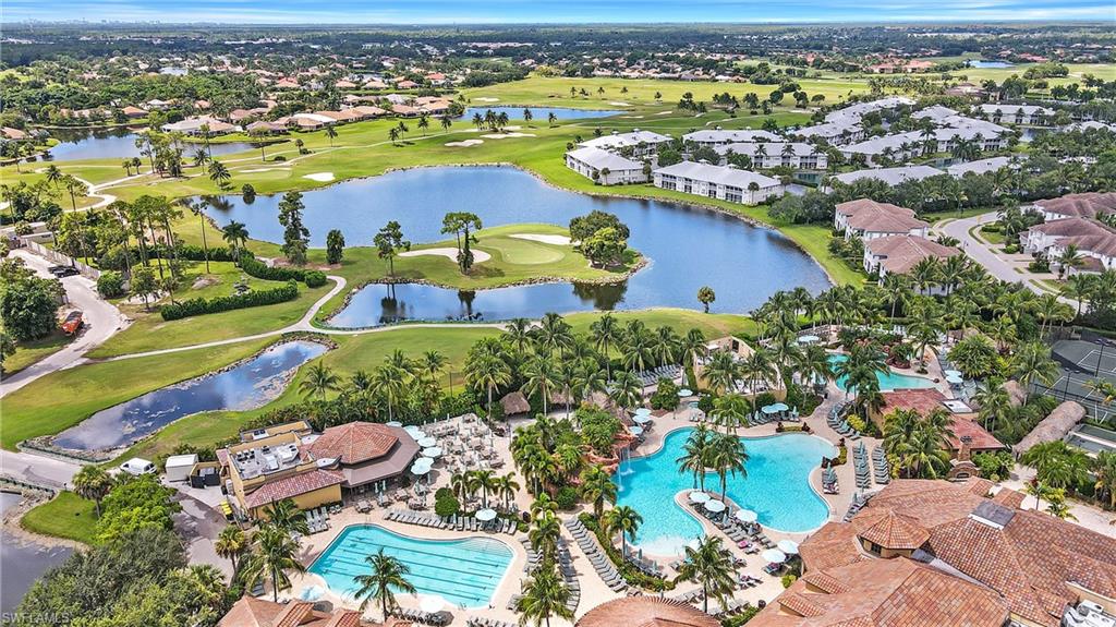 7511 Hogan Court Naples, FL 34113 - Photo 46 of 50 an aerial view of residential houses with outdoor space