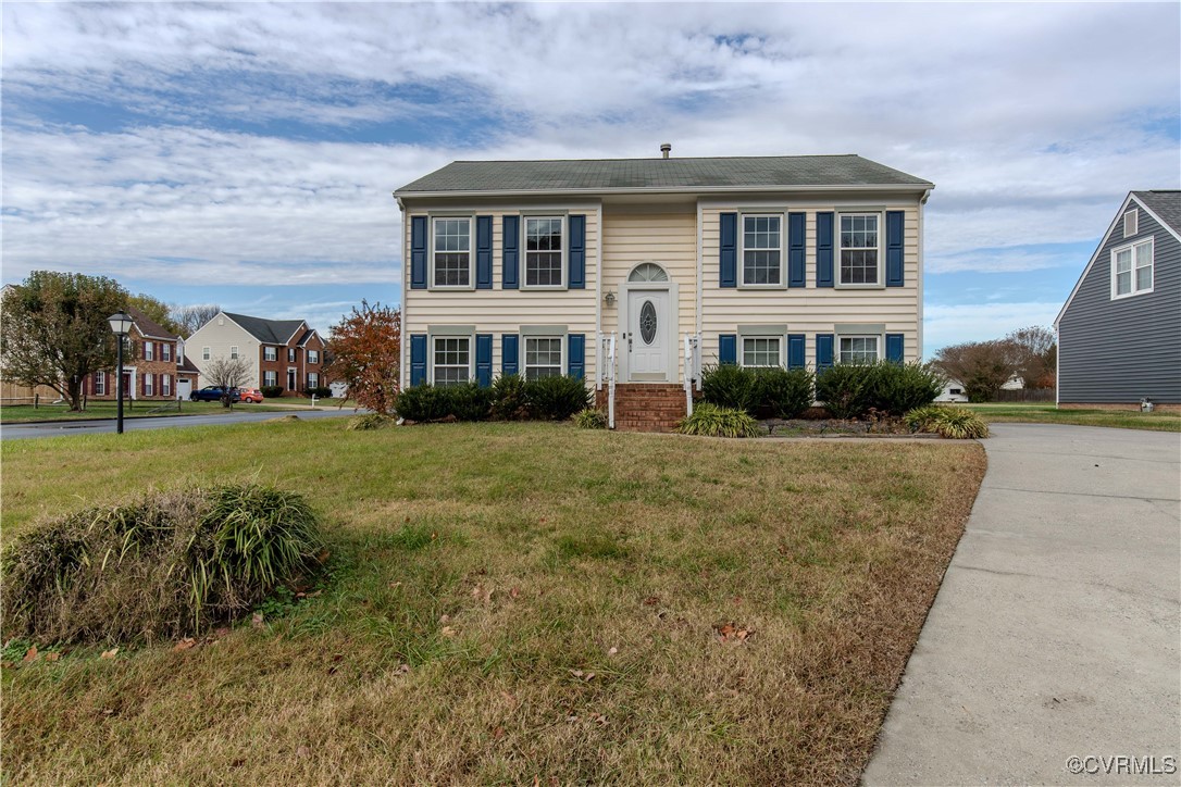 1501 Tree Ridge Road Henrico, VA 23231 - Photo 25 of 25 a front view of a house with a yard