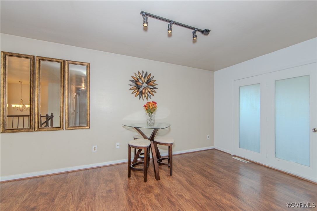 1501 Tree Ridge Road Henrico, VA 23231 - Photo 7 of 25 a view of a livingroom with furniture wooden floor and window