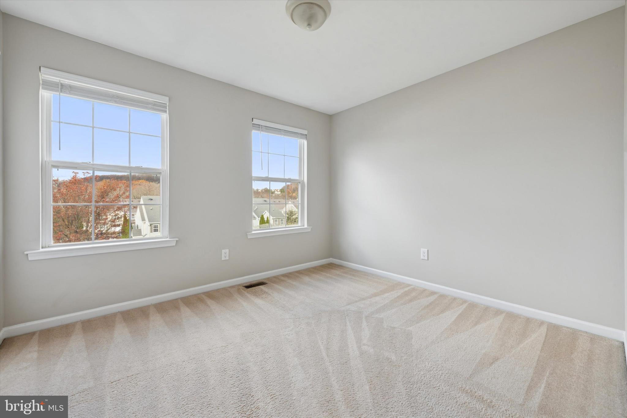 63 Granite Lane, Unit 2 Chester Springs, PA 19425 - Photo 11 of 15 an empty room with windows