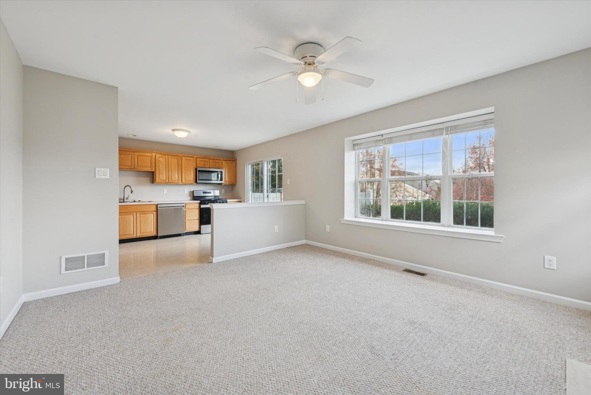 63 Granite Lane, Unit 2 Chester Springs, PA 19425 - Photo 2 of 15 a view of an empty room with a window