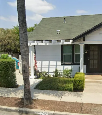 a front view of a house with a garage