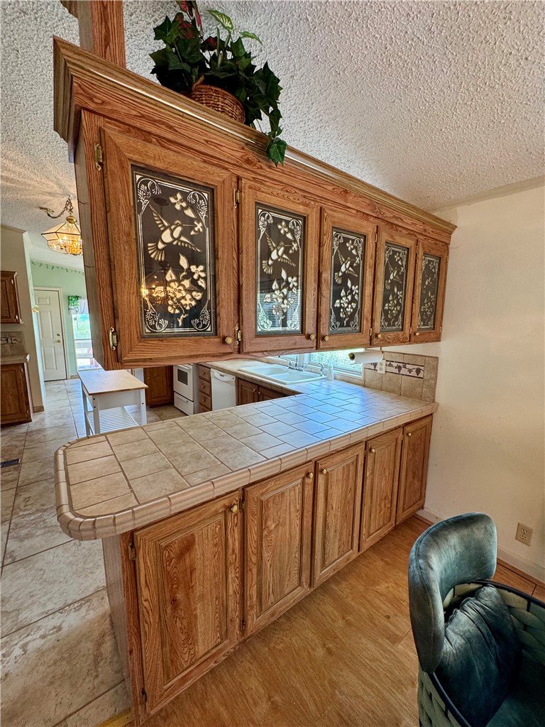 25051 Lake Shore Drive Mathis, TX 78368 - Photo 19 of 40 a living room with furniture and a wooden floor