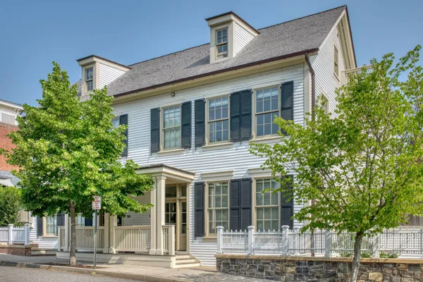 a view of an entryway with flower pots