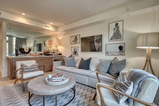 a room with furniture and a mirror