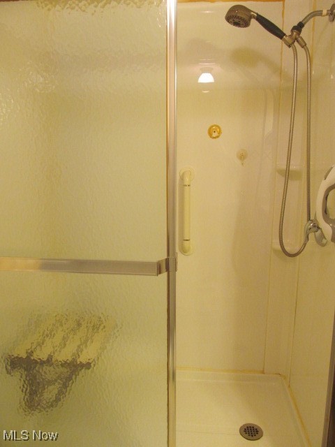 9735 Chillicothe Road, Unit 2 Willoughby, OH 44094 - Photo 35 of 49 Bathroom featuring a stall shower