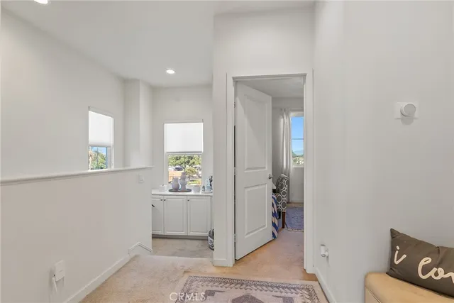 a bedroom with bed and window