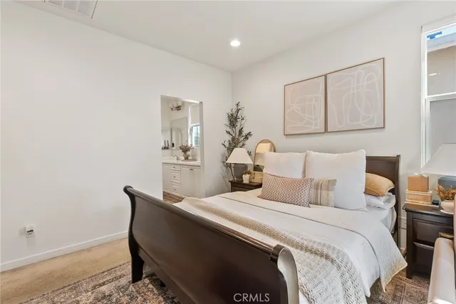 a view of a chair and tables in the balcony