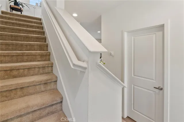 a view of a workspace with furniture and workspace