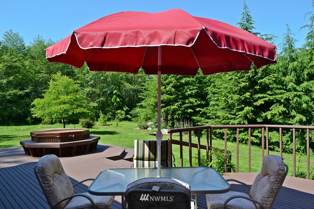 2469 Goss Ridge Road Freeland, WA 98249 - Photo 1 of 25 a view of yard with seating area and trees