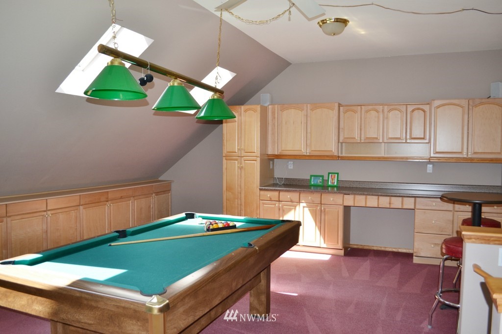 2469 Goss Ridge Road Freeland, WA 98249 - Photo 12 of 25 a room with pool table and windows