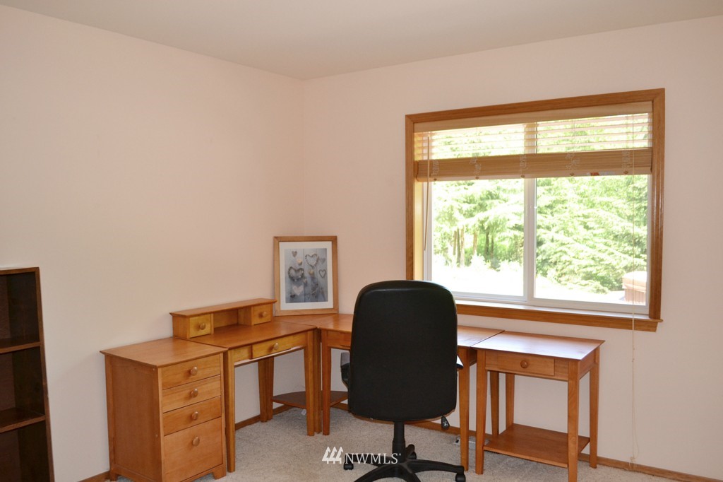 2469 Goss Ridge Road Freeland, WA 98249 - Photo 17 of 25 a view of a workspace with furniture and a window