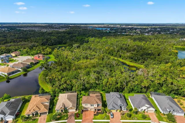 a front view of a house with yard porch and furniture