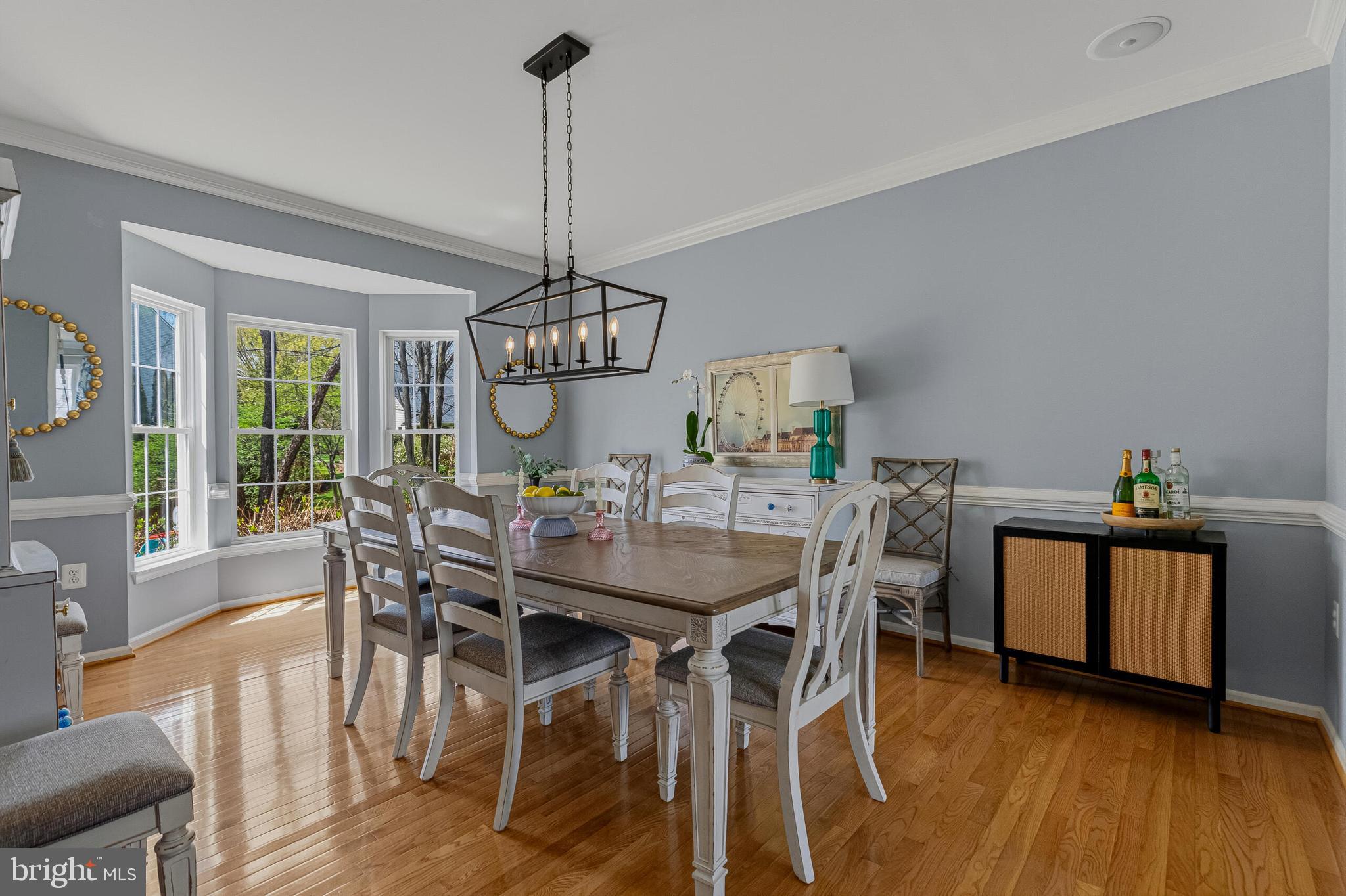 1403 Harle Place Southwest Leesburg, VA 20175 - Photo 13 of 41 a view of a dining room with furniture window and wooden floor